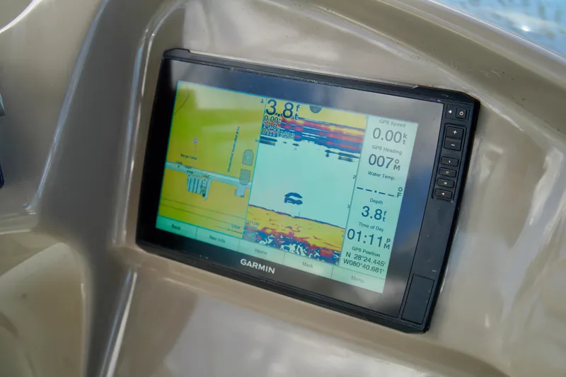 Slide: The Image of Garmin navigation display on 1999 Carver 450 Voyager Pilothouse showing depth and GPS data. - 75