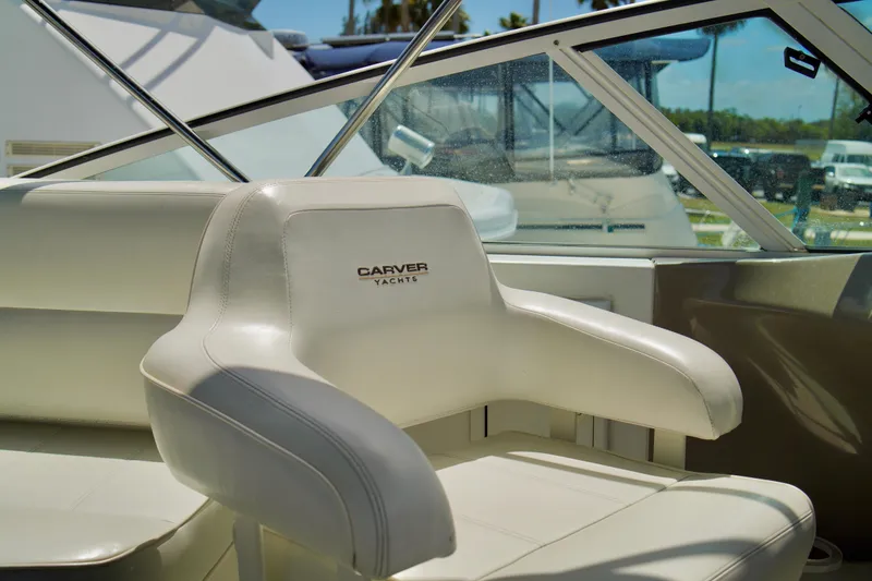 Slide: The Image of White leather seat on a 1999 Carver 450 Voyager Pilothouse yacht. - 77