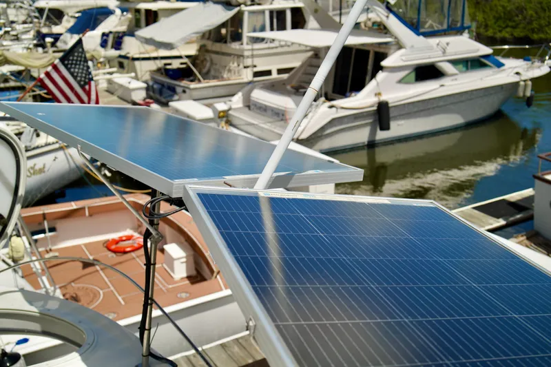 Slide: The Image of Solar panels on a 1999 Carver 450 Voyager Pilothouse yacht at a marina. - 84
