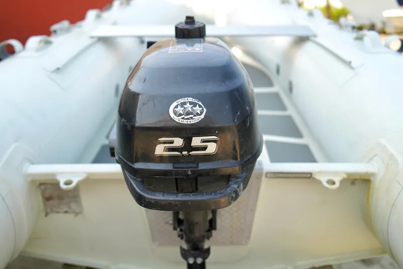 Slide: The Image of Outboard motor on a Carver 450 Voyager Pilothouse, 1999 model. - 89