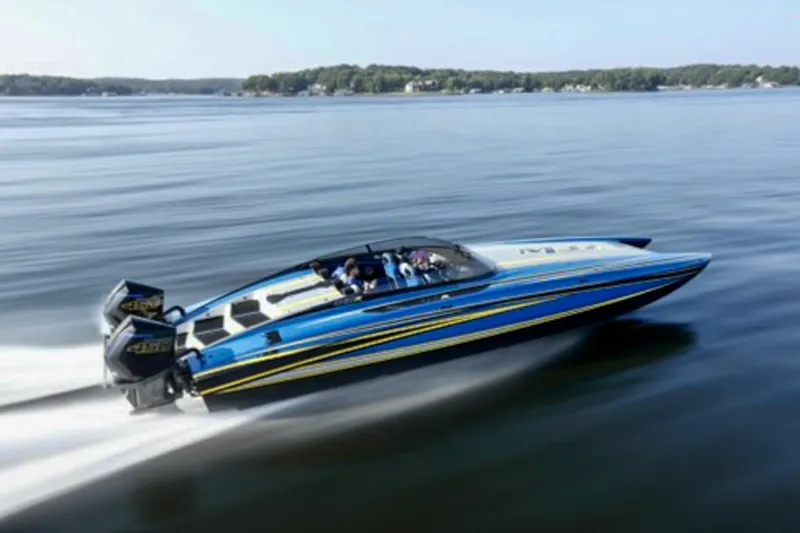 The Image of 2022 DCB M37 speedboat cruising on a calm lake, showcasing sleek design and powerful engines. - 0
