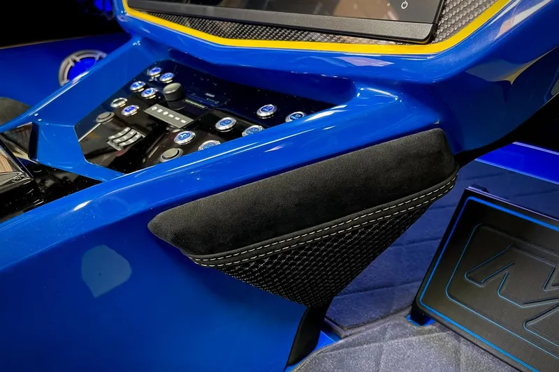 Slide: The Image of Interior of 2022 DCB M37 with sleek blue dashboard and control panel. - 15