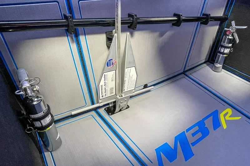 Slide: The Image of Interior of 2022 DCB M37 boat with safety equipment and branding. - 9