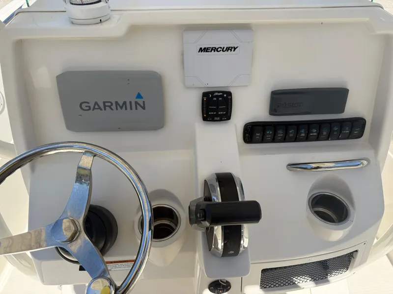 Slide: The Image of Control panel of 2023 Sailfish 220 CC boat with Garmin and Mercury equipment. - 19