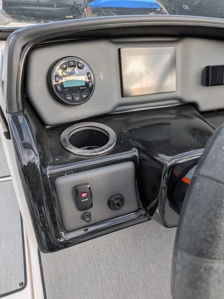 Slide: The Image of Dashboard of 2023 Yamaha SX195 boat with controls and display. - 11
