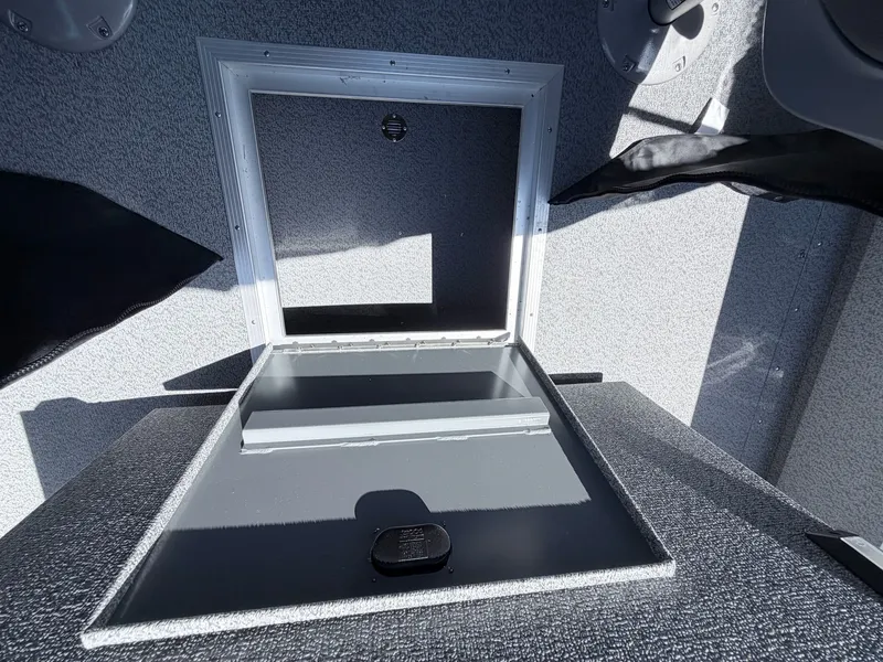 Slide: The Image of Starcraft Fishmaster 196 2026 boat hatch open. - 44