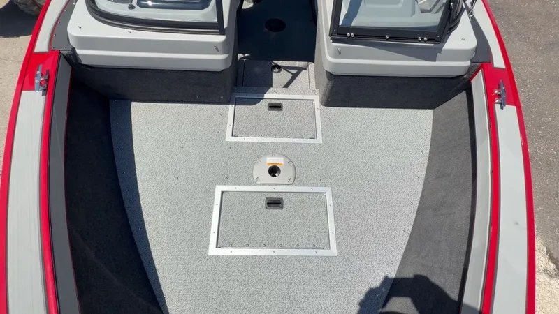 Slide: The Image of Starcraft Fishmaster 196 boat 2026, front deck view with storage compartments. - 45