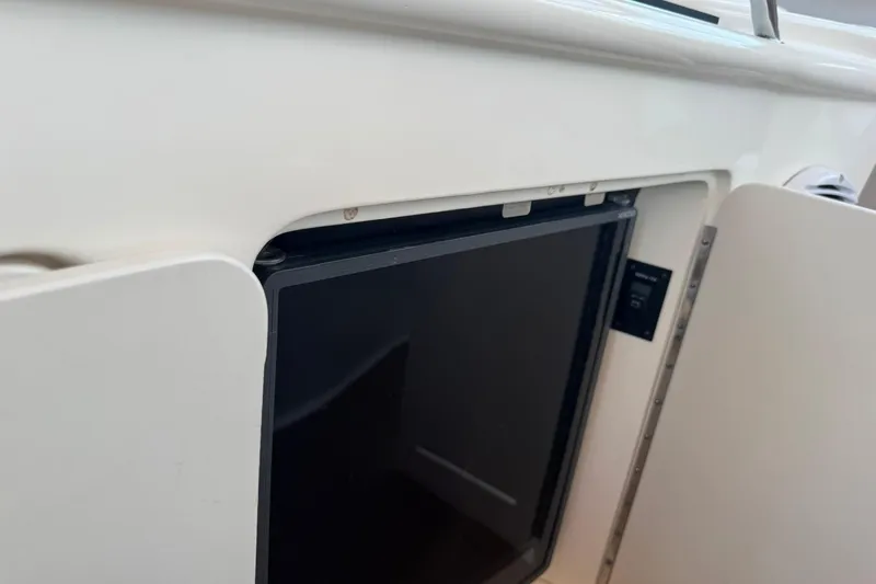 Slide: The Image of Cabinet door on a 2001 Sea Ray 340 Sundancer boat interior. - 22