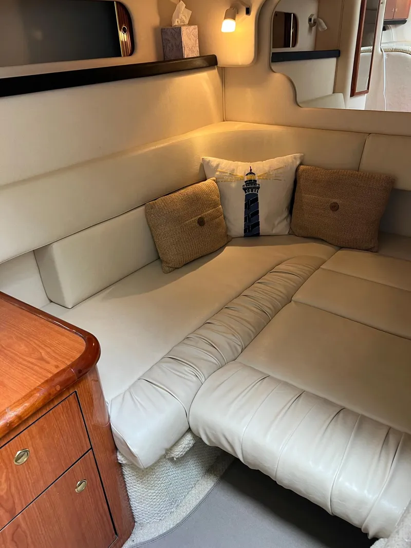Slide: The Image of Interior of a 2001 Sea Ray 340 Sundancer with beige sofa. - 30