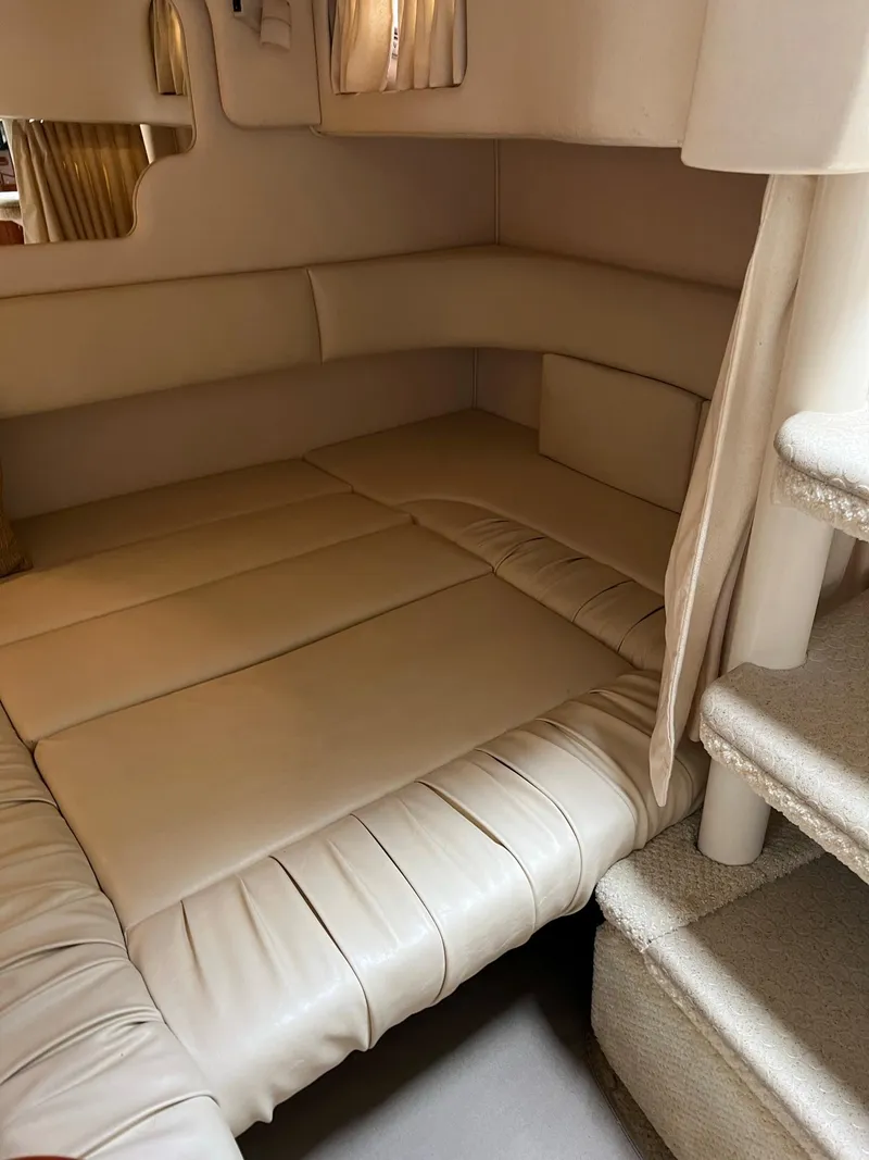Slide: The Image of Interior of 2001 Sea Ray 340 Sundancer with beige upholstery. - 31