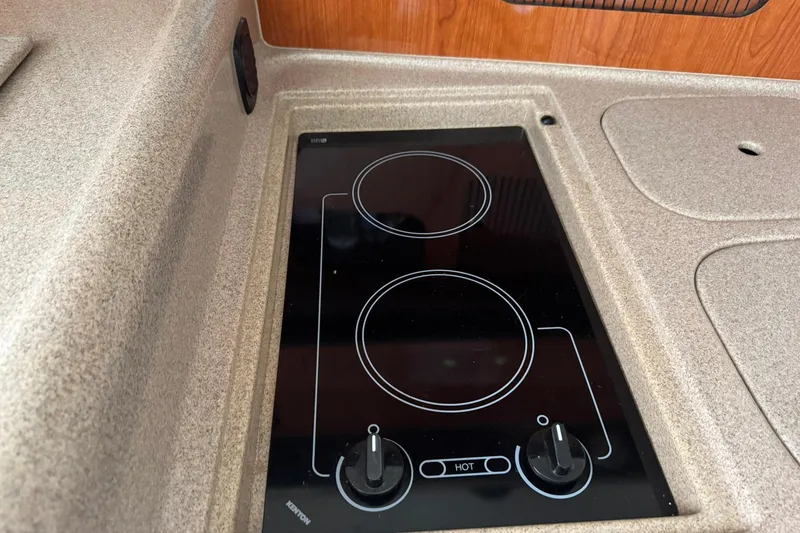 Slide: The Image of Built-in stovetop on 2001 Sea Ray 340 Sundancer yacht kitchen counter. - 34