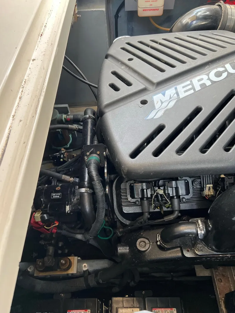 Slide: The Image of Engine compartment of a 2001 Sea Ray 340 Sundancer boat. - 38