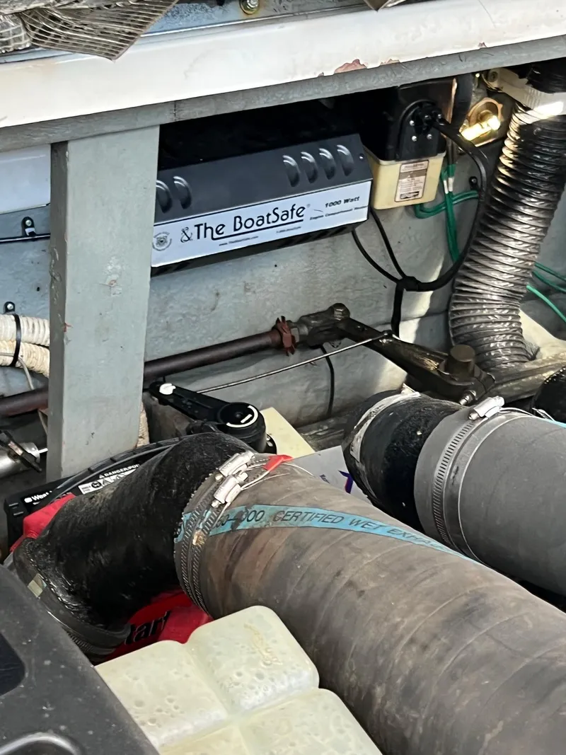 Slide: The Image of Engine compartment of 2001 Sea Ray 340 Sundancer with boat safety system. - 42