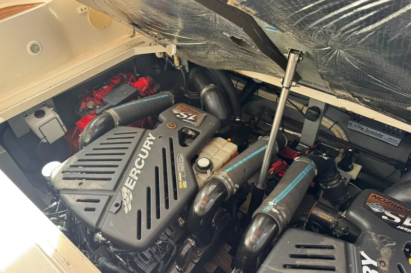 Slide: The Image of Engine compartment of a 2001 Sea Ray 340 Sundancer with Mercury 5.7L engines. - 45