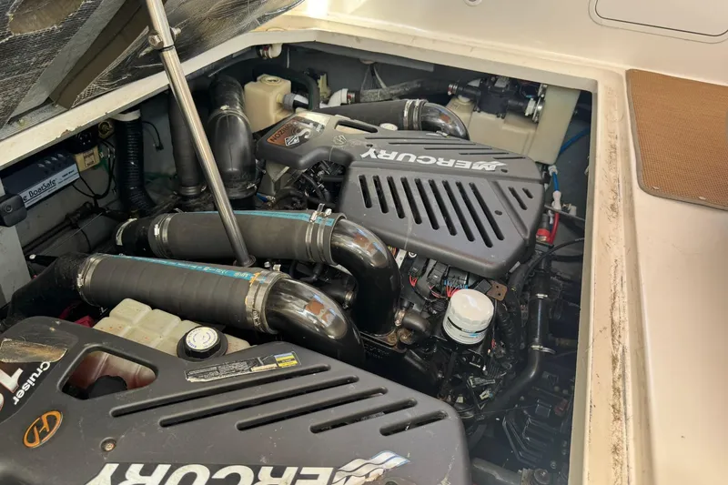 Slide: The Image of Engine compartment of a 2001 Sea Ray 340 Sundancer with MerCruiser engines. - 46