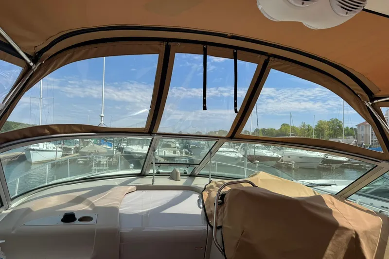 Slide: The Image of Interior view of 2001 Sea Ray 340 Sundancer yacht docked at marina. - 9