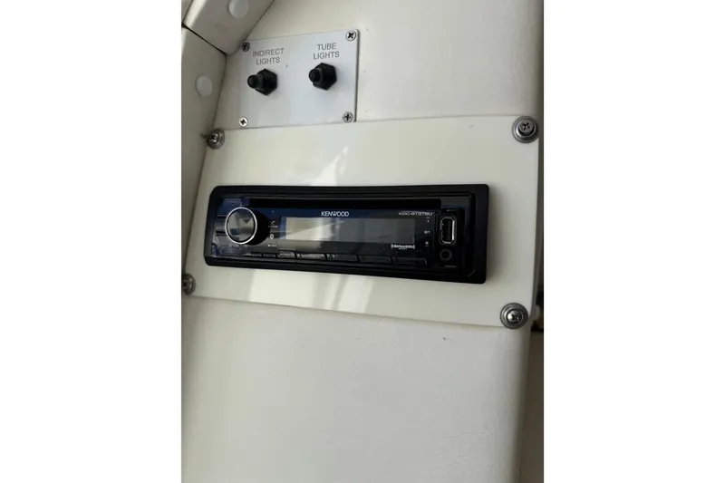 Slide: The Image of Kenwood stereo system in 2004 Fountain 27 Fever boat interior. - 37