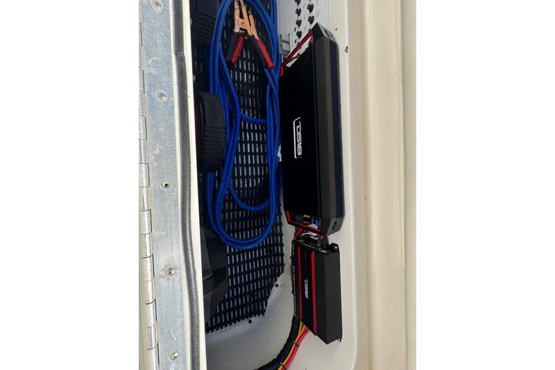 Slide: The Image of 2004 Fountain 35 Lightning boat interior wiring with amplifiers and cables. - 19