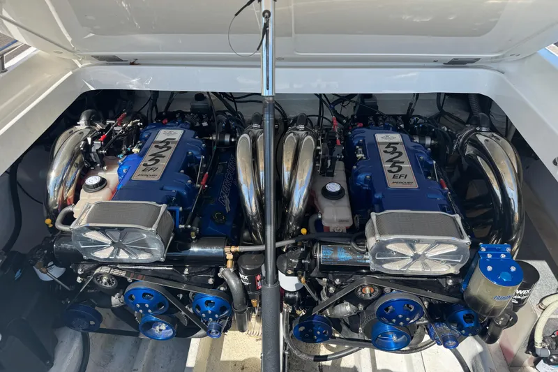 Slide: The Image of Twin Mercury 525 EFI engines in a 2004 Fountain 35 Lightning boat. - 24