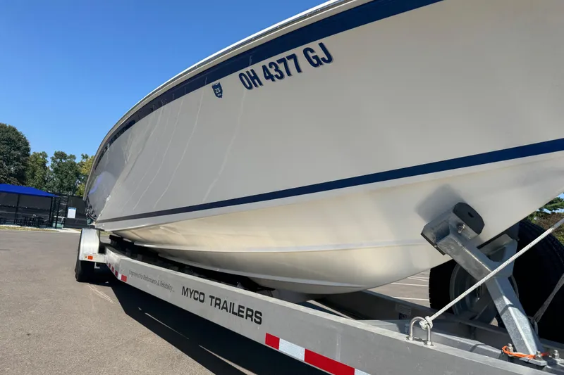 Slide: The Image of 2004 Fountain 35 Lightning boat on Myco trailer, parked outdoors. - 9