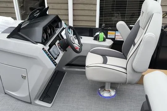 Slide: The Image of Boat cockpit with modern controls and comfortable seating, Viaggio X22D 2026 model. - 3