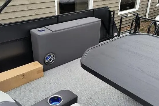 Slide: The Image of Interior of 2026 Viaggio x22u boat with modern seating and speaker system. - 15