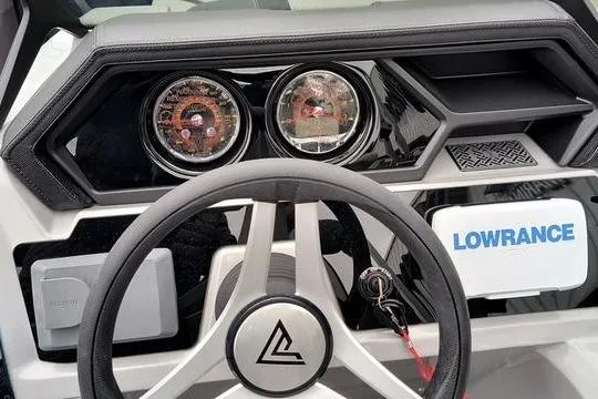 Slide: The Image of Dashboard of a 2026 Viaggio x22u with steering wheel and Lowrance display. - 5