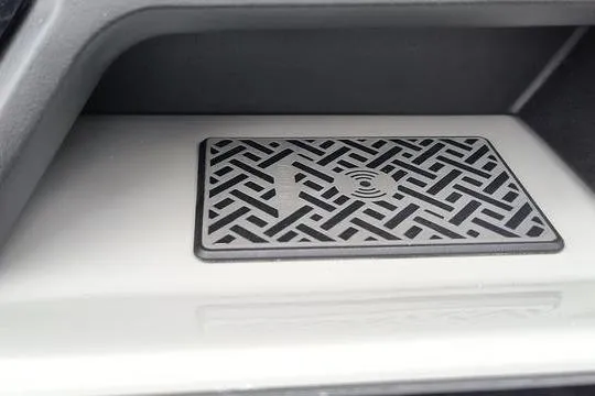 Slide: The Image of Wireless charging pad in 2026 Viaggio x22u car, featuring a modern geometric design. - 7