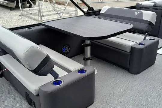 Slide: The Image of Modern Viaggio x22u 2026 boat interior with sleek seating and table setup. - 8