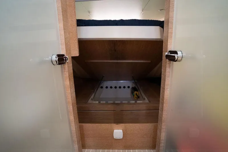 Slide: The Image of 2020 Scout 530 LXF cabin interior with open storage compartment. - 106