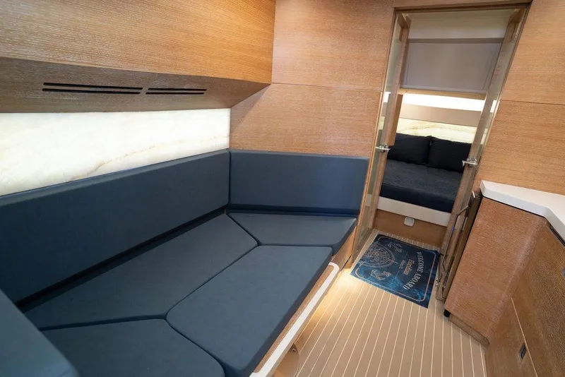 Slide: The Image of Luxurious interior of 2020 Scout 530 LXF yacht with modern seating and cozy cabin. - 110
