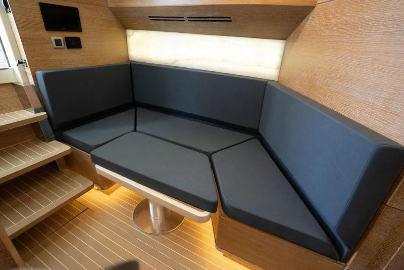 Slide: The Image of Luxurious interior seating area of 2020 Scout 530 LXF yacht with modern design. - 114