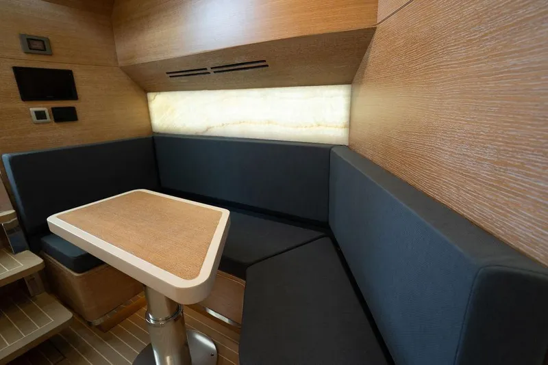 Slide: The Image of Luxurious interior of 2020 Scout 530 LXF yacht with elegant seating and table. - 118