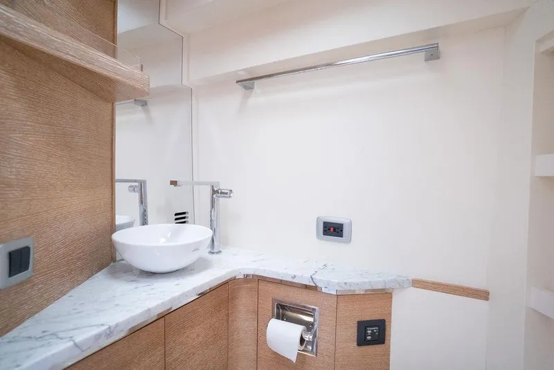 Slide: The Image of Luxurious bathroom interior of 2020 Scout 530 LXF yacht with marble countertop and modern fixtures. - 124