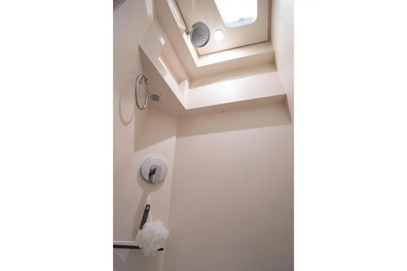 Slide: The Image of Luxurious shower area in 2020 Scout 530 LXF yacht, featuring modern fixtures and lighting. - 127