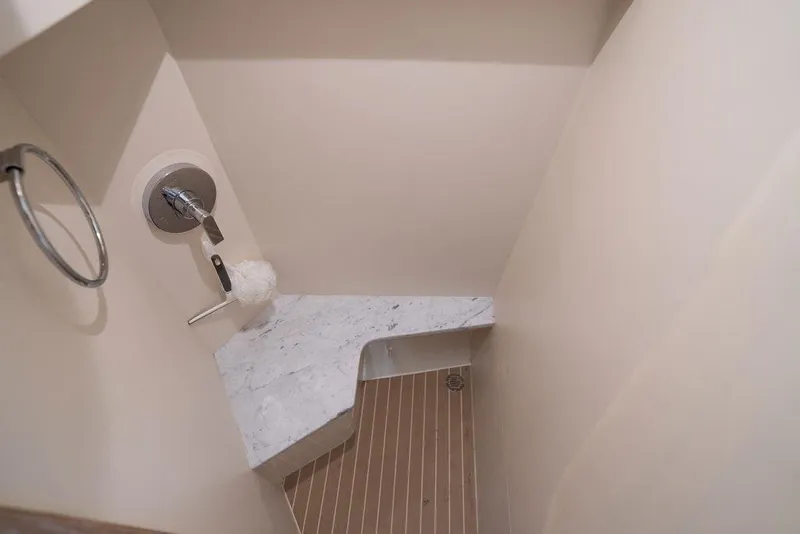 Slide: The Image of Luxurious bathroom interior of 2020 Scout 530 LXF yacht with marble countertop. - 128