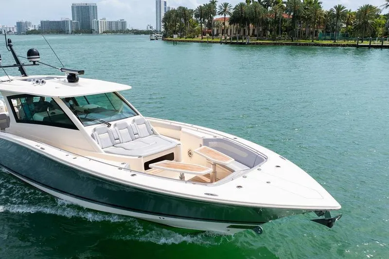 Slide: The Image of 2020 Scout 530 LXF luxury yacht cruising in tropical waters. - 13