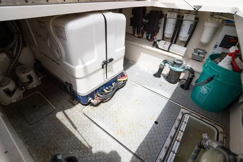 Slide: The Image of Engine room of 2020 Scout 530 LXF boat with equipment and storage. - 130