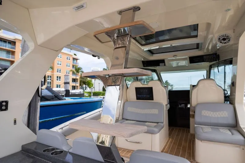 Slide: The Image of Interior of 2020 Scout 530 LXF yacht with modern seating and sleek design. - 141