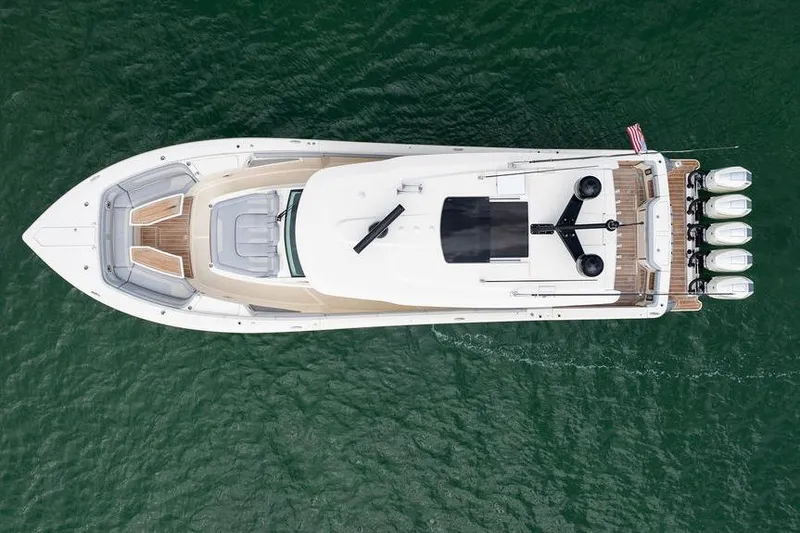 Slide: The Image of Aerial view of 2020 Scout 530 LXF yacht on green water. - 15