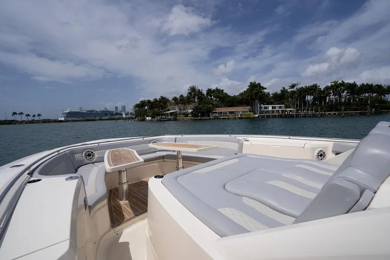 Slide: The Image of Luxurious 2020 Scout 530 LXF boat interior with ocean view and palm trees. - 66