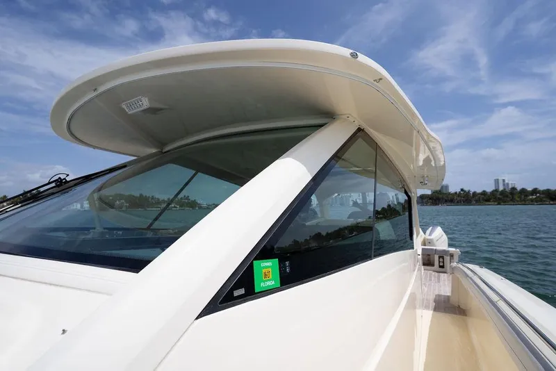 Slide: The Image of 2020 Scout 530 LXF boat on water, showcasing sleek design and modern features. - 68