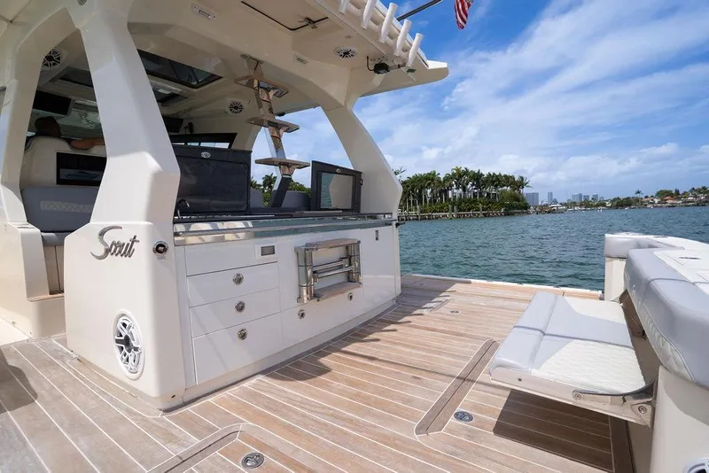 Slide: The Image of Luxurious 2020 Scout 530 LXF yacht interior with sleek design and waterfront view. - 79