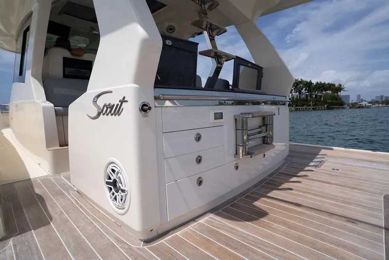 Slide: The Image of 2020 Scout 530 LXF luxury yacht deck with sleek design and modern amenities. - 80