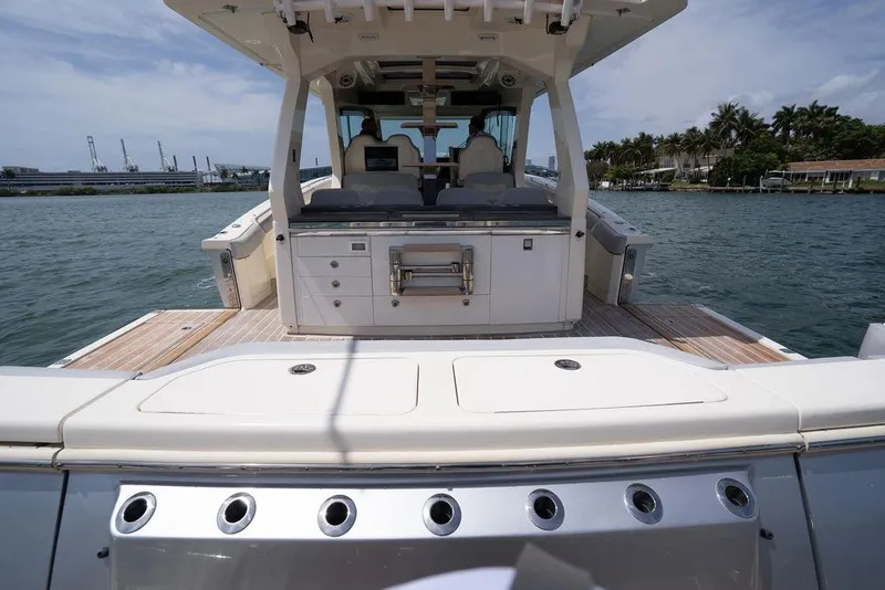 Slide: The Image of 2020 Scout 530 LXF luxury boat with spacious deck and modern amenities. - 86