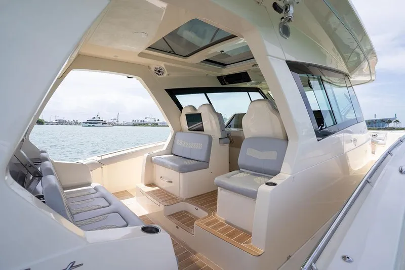 Slide: The Image of Luxurious interior of 2020 Scout 530 LXF boat with plush seating and scenic ocean view. - 89