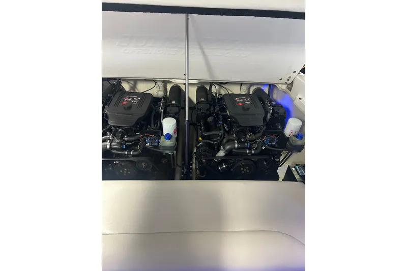 Slide: The Image of 2004 Sunsation 32 Dominator engine compartment with dual high-performance engines. - 14