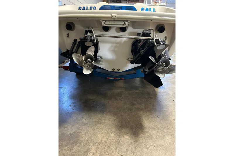 Slide: The Image of Rear view of a 2004 Sunsation 32 Dominator boat with dual propellers. - 7