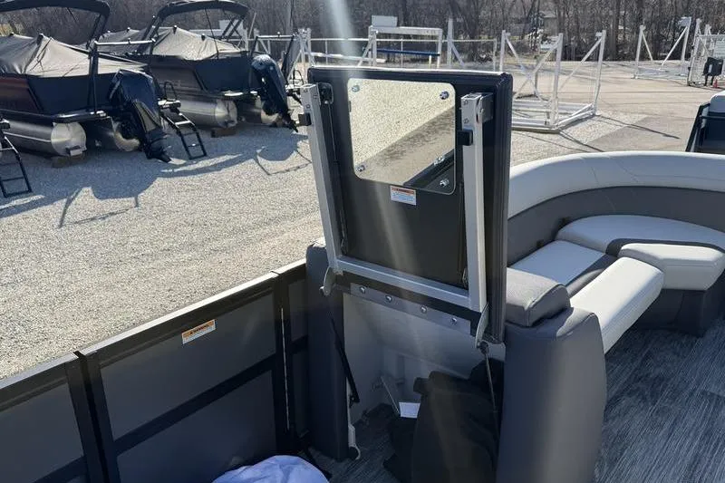 Slide: The Image of Interior of 2026 Viaggio X22D boat with seating and storage compartment. - 11