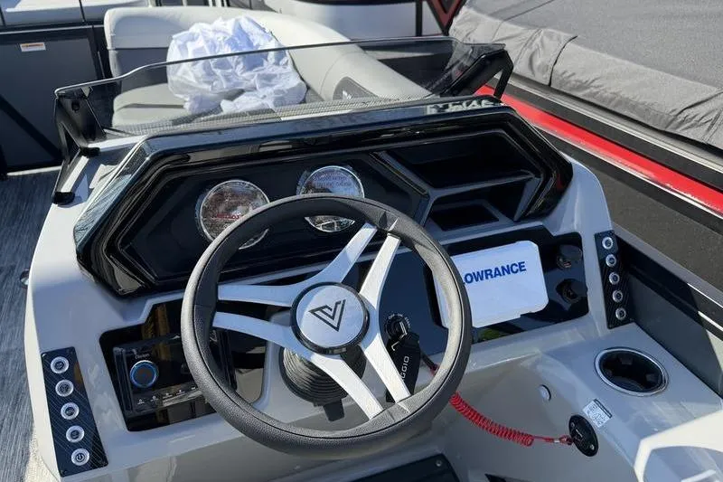 Slide: The Image of Steering console of 2026 Viaggio X22D boat with modern controls and navigation system. - 4